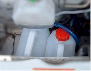 Water container under the bonnet